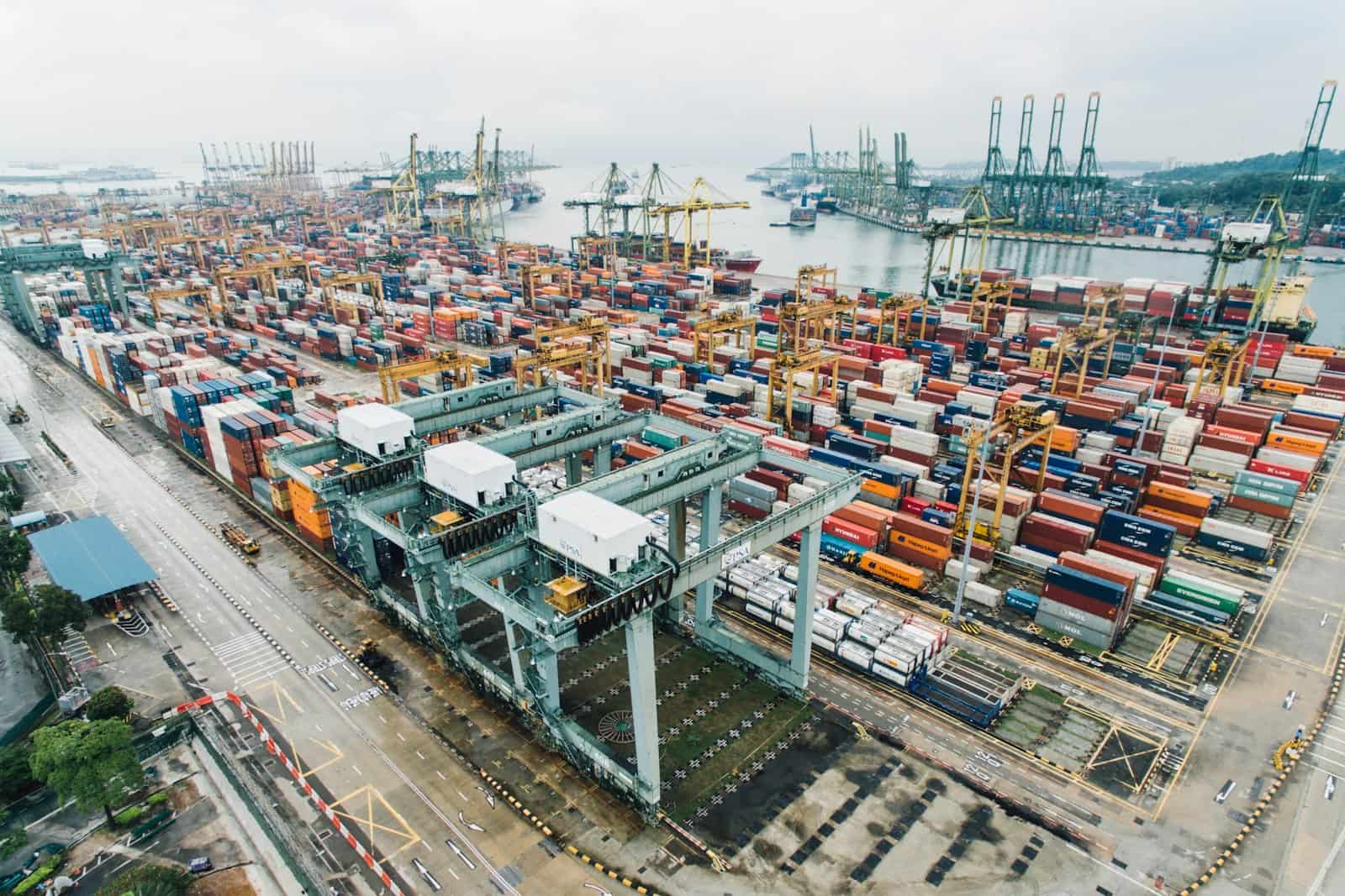 Container port with cranes and shipping containers